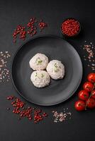 Delicious healthy steamed chicken cutlets or minced meatballs photo