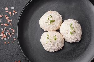 Delicious healthy steamed chicken cutlets or minced meatballs photo