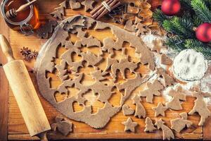 Gingerbread dough and preparing christmas biscuit cakes photo