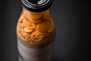 Ingredients for making delicious sweet pancakes that are portioned in a bottle photo