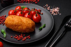 Delicious baked potato cutlet stuffed with chicken and vegetables, spices and salt photo