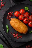 Delicious baked potato cutlet stuffed with chicken and vegetables, spices and salt photo