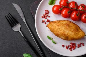 Delicious baked potato cutlet stuffed with chicken and vegetables, spices and salt photo