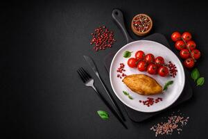 Delicious baked potato cutlet stuffed with chicken and vegetables, spices and salt photo