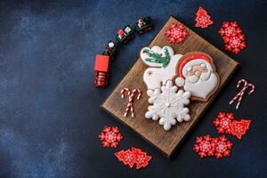 Beautiful festive Christmas gingerbread made by hand with decoration elements photo