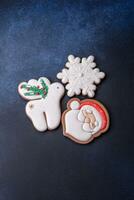 Beautiful festive Christmas gingerbread made by hand with decoration elements photo