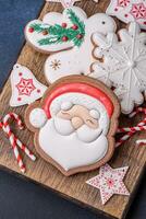 Beautiful festive Christmas gingerbread made by hand with decoration elements photo