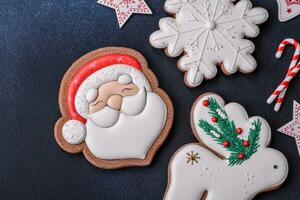 Beautiful festive Christmas gingerbread made by hand with decoration elements photo