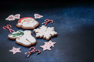 Beautiful festive Christmas gingerbread made by hand with decoration elements photo