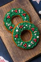 Beautiful festive Christmas gingerbread made by hand with decoration elements photo