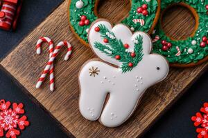 Beautiful festive Christmas gingerbread made by hand with decoration elements photo