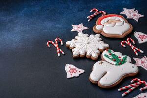 Beautiful festive Christmas gingerbread made by hand with decoration elements photo