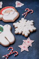 Beautiful festive Christmas gingerbread made by hand with decoration elements photo