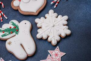 Beautiful festive Christmas gingerbread made by hand with decoration elements photo