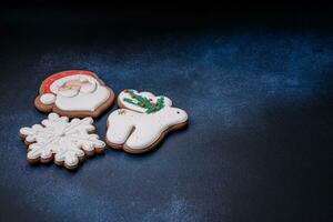 Beautiful festive Christmas gingerbread made by hand with decoration elements photo