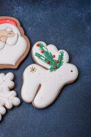 Beautiful festive Christmas gingerbread made by hand with decoration elements photo