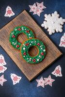 Beautiful festive Christmas gingerbread made by hand with decoration elements photo