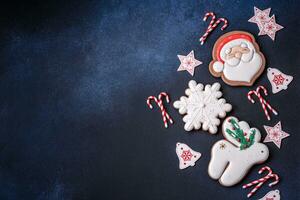 Beautiful festive Christmas gingerbread made by hand with decoration elements photo