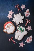 Beautiful festive Christmas gingerbread made by hand with decoration elements photo