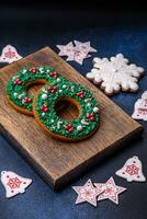 Beautiful festive Christmas gingerbread made by hand with decoration elements photo