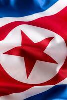 North korea flag. Colorful North Korea flag waving in the wind photo