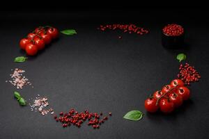 Ingredients for cooking cherry tomatoes, salt, spices and herbs photo