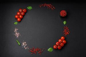 Ingredients for cooking cherry tomatoes, salt, spices and herbs photo