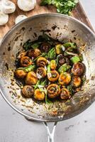 Roasted mushrooms in a wok with spring peas, onion and teriyaky sauce photo