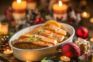 Christmas dinner from fish salmon in roasting dish with festive decoration advent wreath and candles. photo