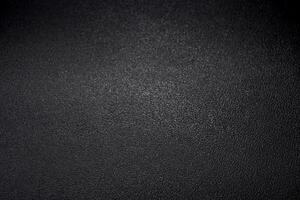 Texture of a concrete wall with cracks and scratches which can be used as a background photo