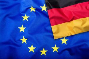 Flags of the Germany and the European Union. Germany Flag and EU Flag. Flag inside stars. World flag concept. photo