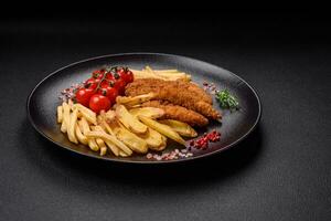 Delicious crispy chicken nuggets breaded with salt and spices photo