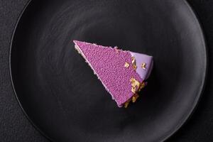 Delicious fresh sweet mousse cake with berry filling photo