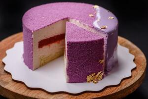 Delicious fresh sweet mousse cake with berry filling photo