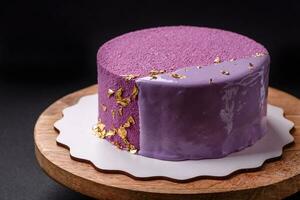 Delicious fresh sweet mousse cake with berry filling photo