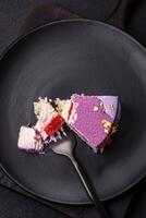 Delicious fresh sweet mousse cake with berry filling photo