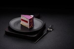 Delicious fresh sweet mousse cake with berry filling photo