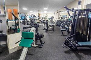 Grodno, Belarus - January 04, 2018 Interior of the fitness club Fitworld with fitness equipment photo