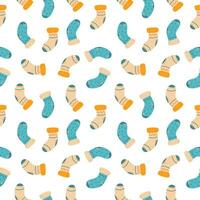 Autumn seamless pattern with warm socks vector