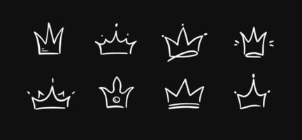 Doodle crown hand drawn set. Doodle princess crown, queen tiara. Line sketch royal element. Queen, king hand drawn simple design element. Isolated vector