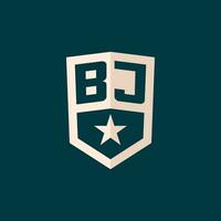 Initial BJ logo star shield symbol with simple design vector