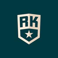 Initial RK logo star shield symbol with simple design vector