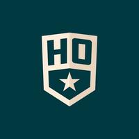Initial HO logo star shield symbol with simple design vector