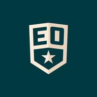 Initial EO logo star shield symbol with simple design vector