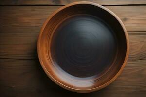 Empty wooden bowl on wooden background. Top view. Copy space. ai generative photo