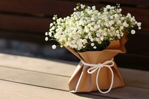 A bouquet of gypsophila flowers in a craft package on the table. AI Generative photo