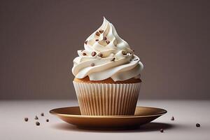 Vanilla cupcake with cream and chocolate chips. photo