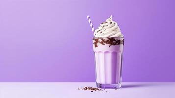 Milkshake with cream and straw. photo