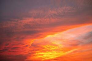 beautiful , luxury soft gradient orange gold clouds and sunlight on the blue sky perfect for the background, take in everning,Twilight photo