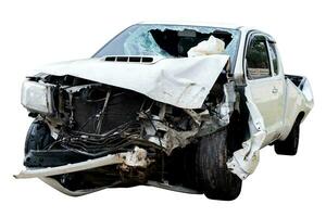 Front and side of white pickup car get damaged by accident on the road. damaged cars after collision. isolated on white background with clipping path, car crash bumper on the road for graphic element photo
